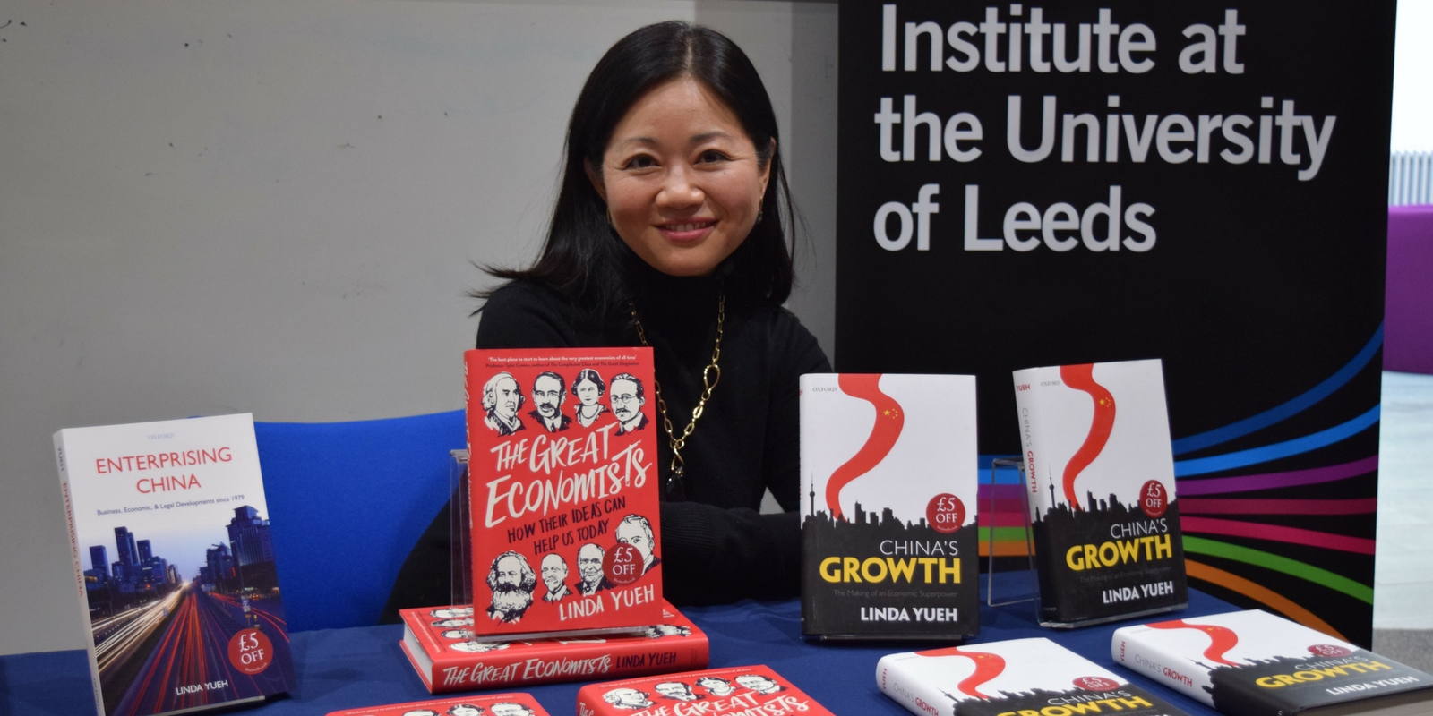 Speaker Linda Yueh with her books