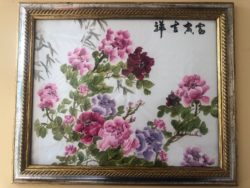A Chinese-style painting of pink and purple flowers and green leaves