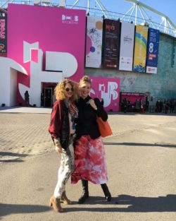 Babette and Natascha smiling outside a Beijing Fashion Week venue