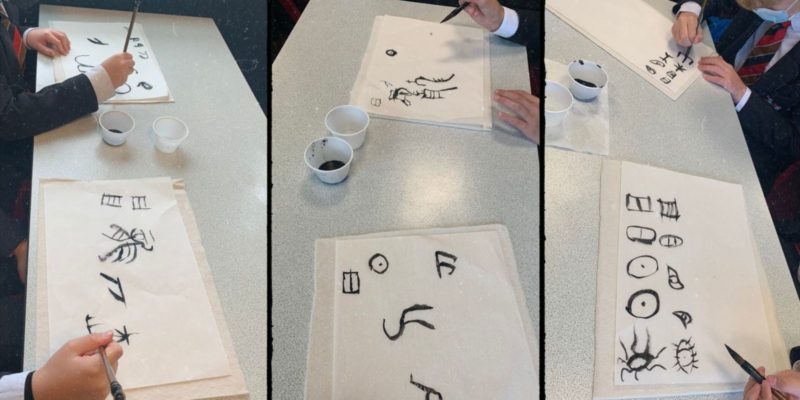 Three images of the Chinese characters students are writing on their paper